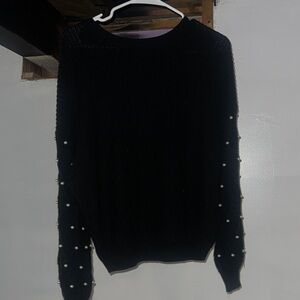 Chic Black Sweater with Pearl Accents